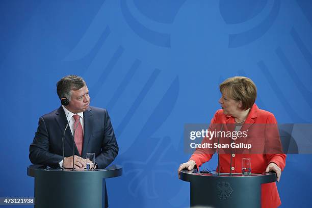 German Chancellor Angela Merkel and King Abdullah II of Jordan speak to the media following talks at the Chancellery on May 13, 2015 in Berlin,...