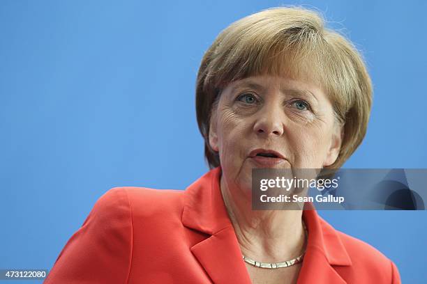 German Chancellor Angela Merkel and King Abdullah II of Jordan speak to the media following talks at the Chancellery on May 13, 2015 in Berlin,...