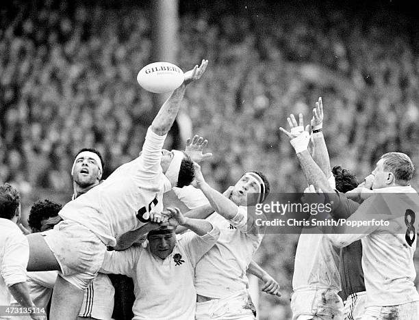 Paul Ackford gets a hand on the ball as the England pack dominate the French during the Five Nations Championship rugby union match between England...