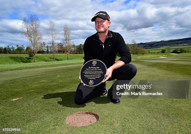 Jamie Donaldson of Wales unveils the Ryder Cup Moment of Victory Plaque on the 15th fairway on the The Gleneagles PGA Centenary Course on May 13,...