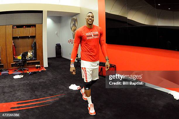 Dwight Howard of the Houston Rockets smiles as he enter the locker room after the win against the Los Angeles Clippers for Game Five of the Western...