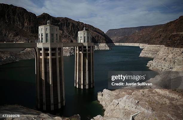 Tall bleached 'bathtub ring' is visible on the steep rocky banks of Lake Mead at the Hoover Dam on May 12, 2015 in Lake Mead National Recreation...