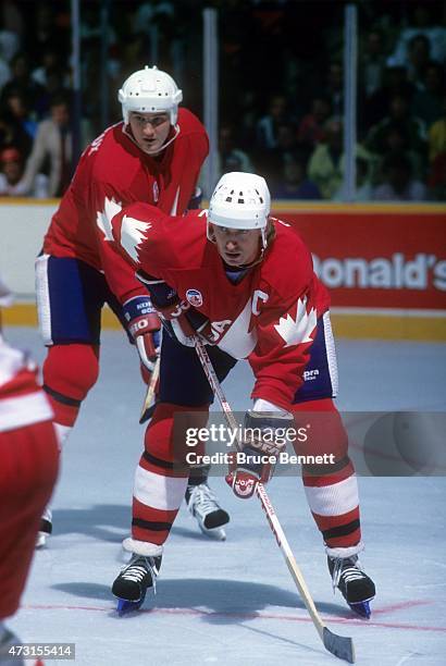 Wayne Gretzky and Mario Lemieux of Team Canada wait for the face-off during Game 2 of the 1987 Canada Cup Finals against Team Soviet Union on...