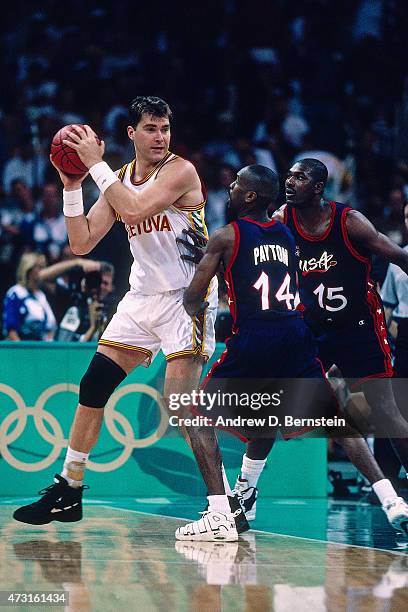 Arvydas Sabonis of the Lithuanian Mens Olympic Basketball Team handles the ball circa 1996 during the 1996 Summer Olmpyics at the Georgia Dome in...