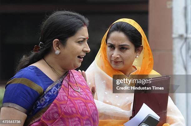 Cabinet Ministers Smiriti Irani and Harsimrat Kaur coming out after cabinet meeting at Parliament on the concluding day of Budget session on May 13,...