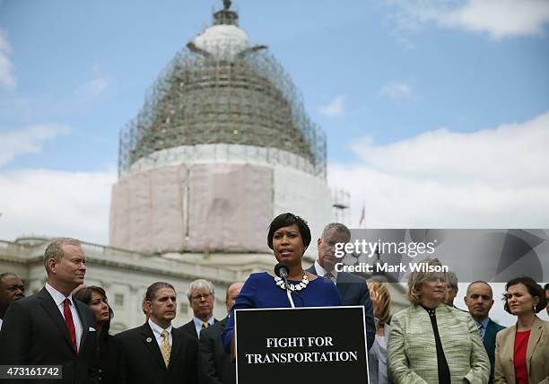 Washington, D.C. Mayor Muriel Bowser speaks about transportation funding while flanked by New York City Mayor Bill de Blasio and other US mayors...