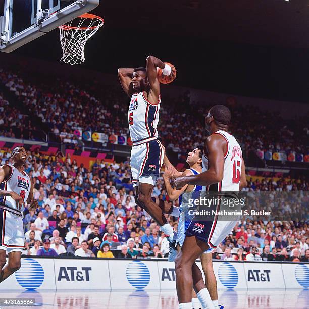 David Robinson of the U.S. Mens Olympic Basketball Team dunks the ball circa 1992 during the 1992 Summer Olympics at Pavelló Olímpic de Badalona in...