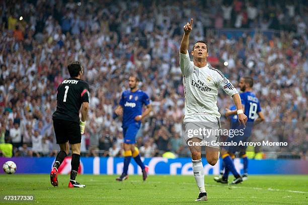 Cristiano Ronaldo of Real Madrid celebrates after scoring the opening goal from the penalty spot during the UEFA Champions League Semi Final, second...