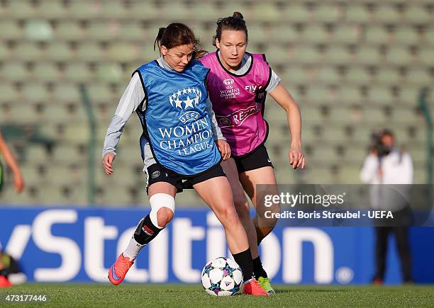 Laure Boulleau of Paris St. Germain is challenged by a team mate during the training session the day before the UEFA Women's Champions League Final...