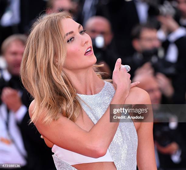 Model Karlie Kloss arrives for the screening of the film "La Tete Haute " and the opening ceremony of the 68th Cannes Film Festival in Cannes, France...