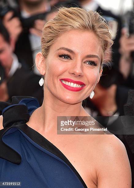 Sienna Miller attends the opening ceremony and premiere of "La Tete Haute during the 68th annual Cannes Film Festival on May 13, 2015 in Cannes,...