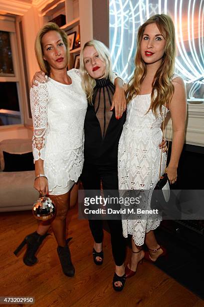 Laura Pradelska, Harriet Verney and a guest arrive at the closing party of 'Les 3 Etages By Dom Perignon' with Sunday Times Style on May 13, 2015 in...