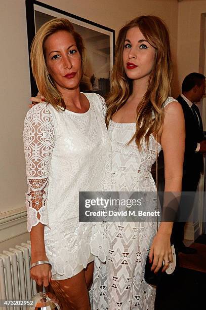 Laura Pradelska and a guest arrive at the closing party of 'Les 3 Etages By Dom Perignon' with Sunday Times Style on May 13, 2015 in London, England.