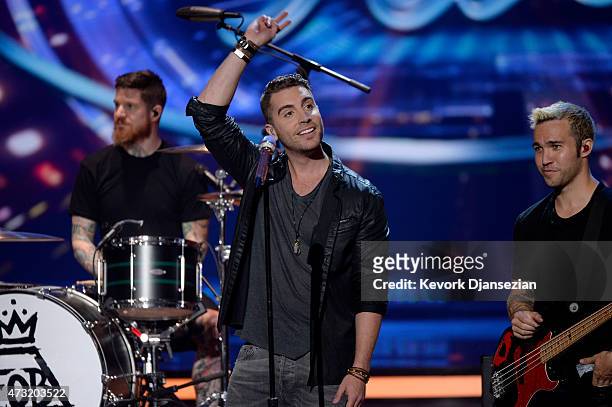 American Idol finalist Nick Fradiani performs onstage with musicians Andy Hurley and Pete Wentz of Fall Out Boy during "American Idol" XIV Grand...