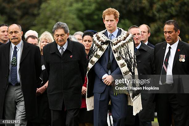 From left, Governor-General Sir Jerry Mateparae, Government House Kaumatua, Lewis Moeau and Prince Harry arrive during a visit to Putiki Marae on May...