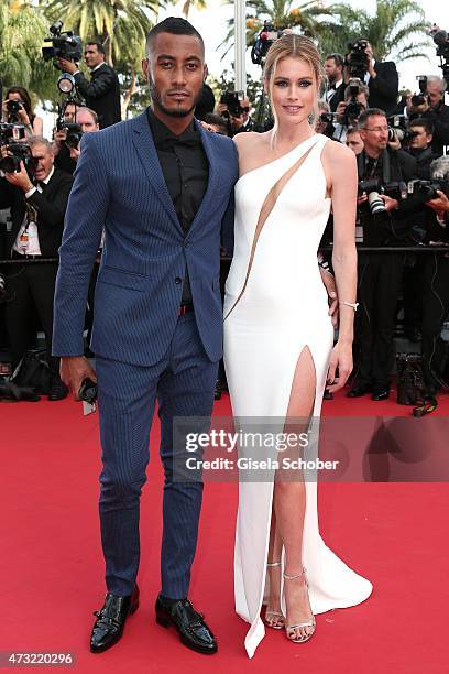 Sunnery James and her husband model Doutzen Kroes attend the opening ceremony and premiere of "La Tete Haute" during the 68th annual Cannes Film...