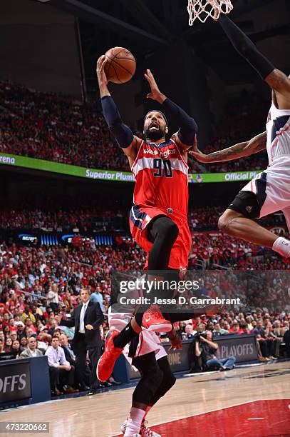 Drew Gooden of the Washington Wizards goes up for the layup against the Atlanta Hawks in Game five of the Eastern Conference Semifinals of the NBA...