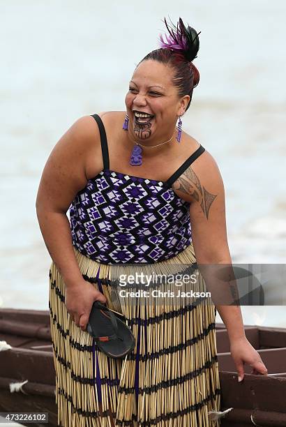 Member of a Waka crew laughs as she waits to transport Prince Harry on a Waka journey on the Whanganui River on May 14, 2015 in Wanganui, New...