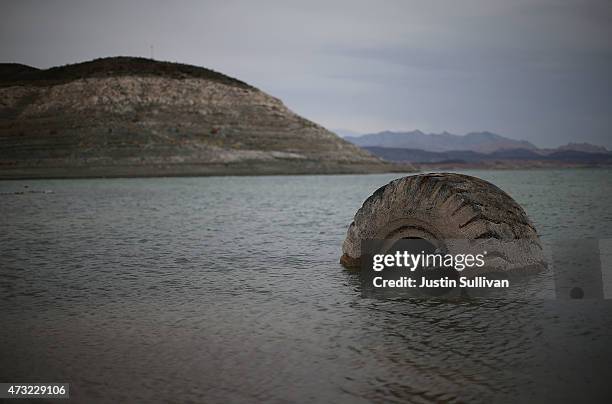 Tractor tire sits in the waters of Lake Mead near Boulder Beach on May 13, 2015 in Lake Mead National Recreation Area, Nevada. As severe drought...