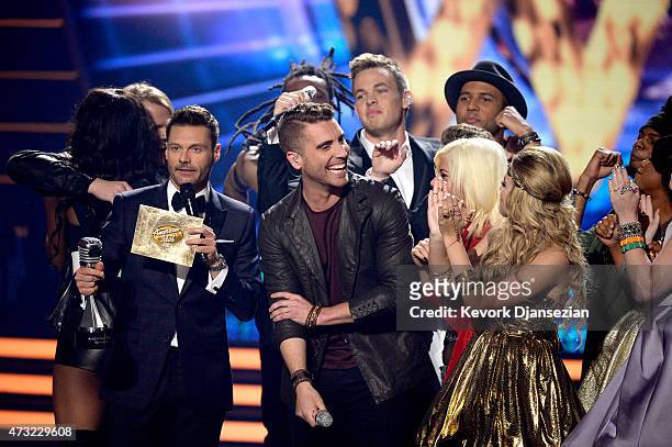 Host Ryan Seacrest announces the winner Nick Fradiani onstage with American Idol finalists Adanna Duru, Qaasim Middleton, Clark Beckham, Rayvon Owen,...