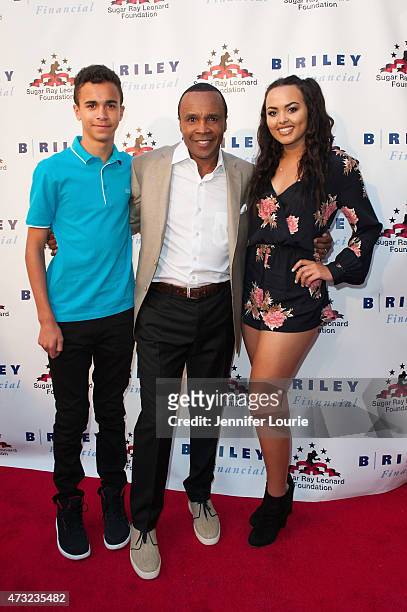 Daniel Leonard, former Boxer Sugar Ray Leonard and Camille Leonard arrive at the 6th Annual "Big Fighters, Big Cause" Charity Boxing Night at the...