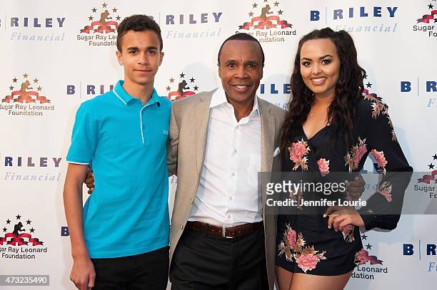 Daniel Leonard, former Boxer Sugar Ray Leonard and Camille Leonard arrive at the 6th Annual "Big Fighters, Big Cause" Charity Boxing Night at the...