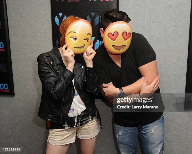 Carly Rae Jepsen and DJ Mack pose at Radio Station Y-100 on May 13, 2015 in Miami, Florida.