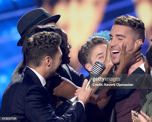 Host Ryan Seacrest announces the winner Nick Fradiani onstage during "American Idol" XIV Grand Finale at Dolby Theatre on May 13, 2015 in Hollywood,...
