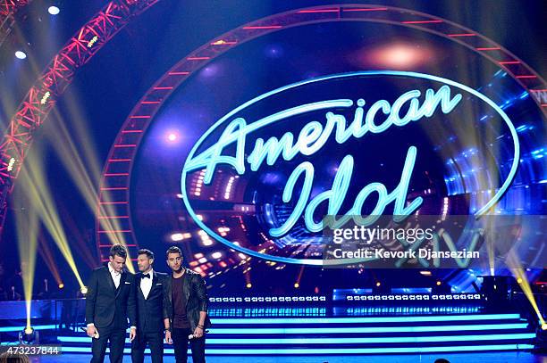 Host Ryan Seacrest, finalists Clark Beckham and Nick Fradiani onstage during "American Idol" XIV Grand Finale at Dolby Theatre on May 13, 2015 in...