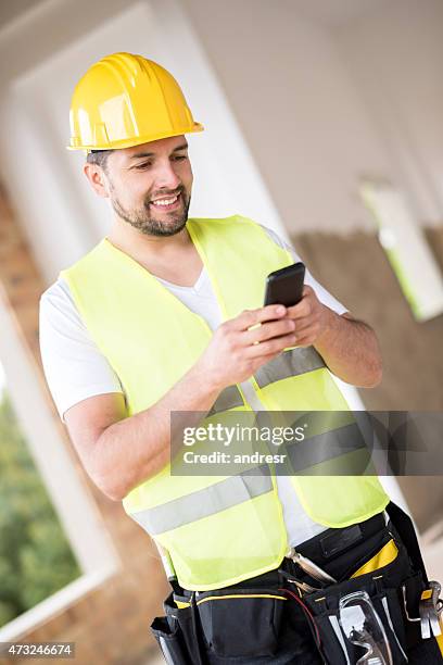 Worker Using Phone 3,029 Construction Worker On Phone Stock Photos, High-Res Pictures, and ...