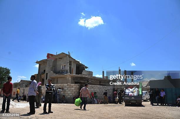 The rubble of buildings destroyed in the clashes between DAESH militants and Kurdish armed groups are seen in the center of the Syrian town of Kobani...