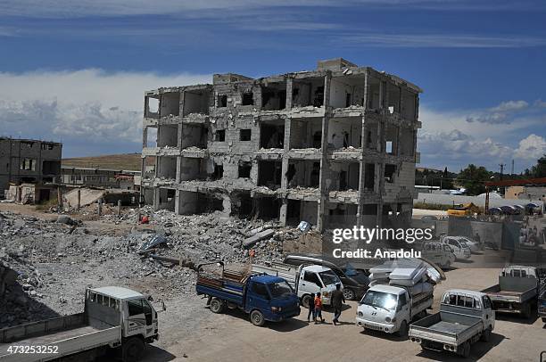 The rubble of buildings destroyed in the clashes between DAESH militants and Kurdish armed groups are seen in the center of the Syrian town of Kobani...