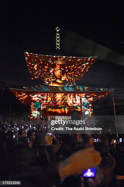 Vairocana statue is projected at the Konpon Daito Tower of the Kongobuji Temple of the Mount Koya on May 13, 2015 in Koya, Wakayama, Japan. Mount...