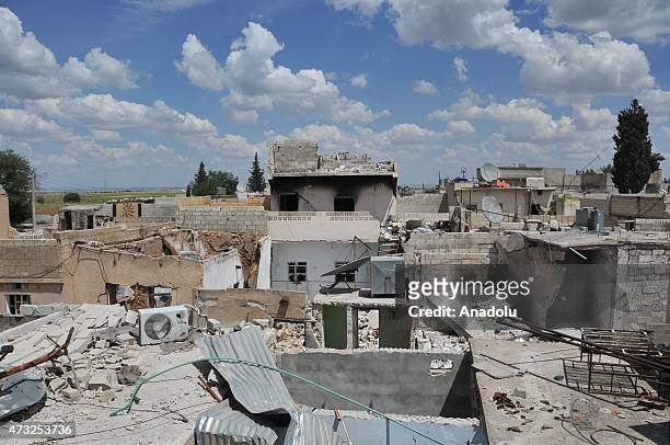 The rubble of buildings destroyed in the clashes between DAESH militants and Kurdish armed groups are seen in the center of the Syrian town of Kobani...