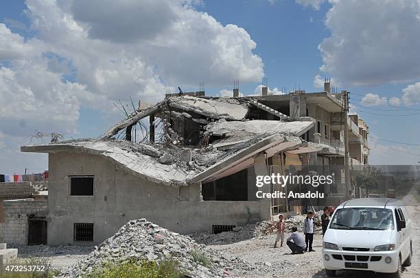 The rubble of buildings destroyed in the clashes between DAESH militants and Kurdish armed groups are seen in the center of the Syrian town of Kobani...