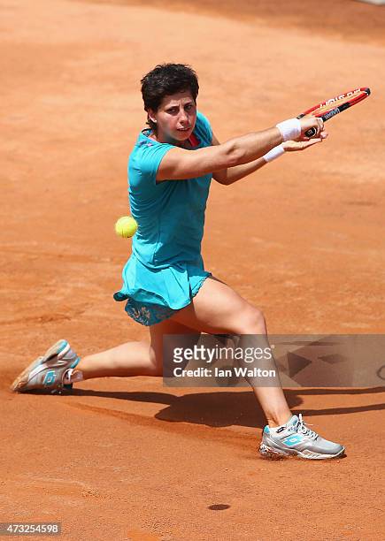 Carla Suárez Navarro of Spain in action during her match against Eugenie Bouchard of Canada on Day Five of the The Internazionali BNL d'Italia 2015...