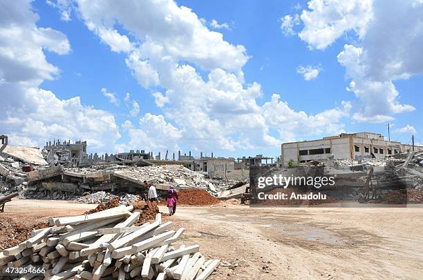 The rubble of buildings destroyed in the clashes between DAESH militants and Kurdish armed groups are seen in the center of the Syrian town of Kobani...