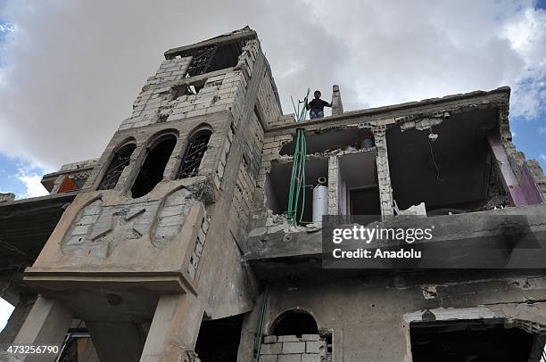 The rubble of buildings destroyed in the clashes between DAESH militants and Kurdish armed groups are seen in the center of the Syrian town of Kobani...