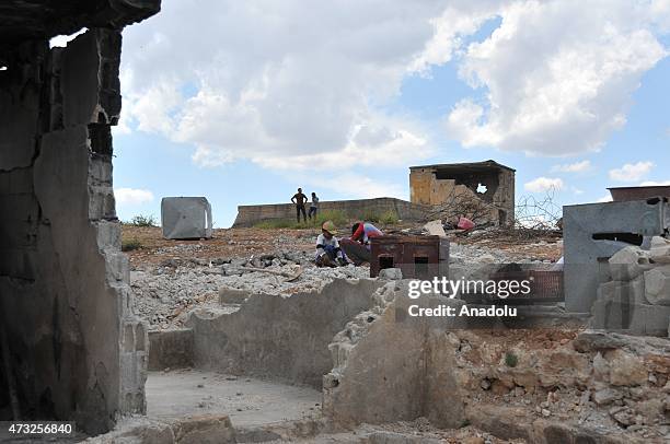 The rubble of buildings destroyed in the clashes between DAESH militants and Kurdish armed groups are seen in the center of the Syrian town of Kobani...