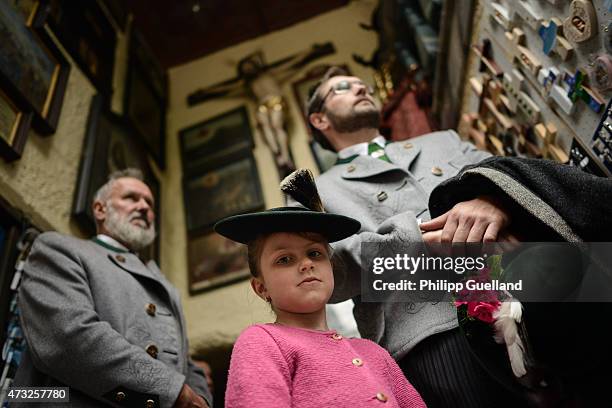Pilgrims in traditional Bavarian folk dress attend the annual Ascension Mass at the open-air altar at Birkenstein on May 14, 2015 near Fischbachau,...