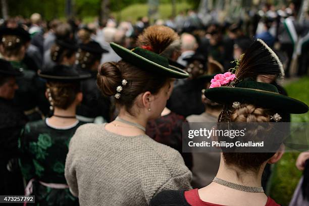 Pilgrims in traditional Bavarian folk dress attend the annual Ascension Mass at the open-air altar at Birkenstein on May 14, 2015 near Fischbachau,...