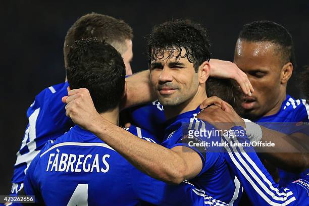 March 11: Diego Costa of Chelsea turns and winks at the PSG fans as he celebrates the goal from Eden Hazard with team mates during the UEFA Champions...
