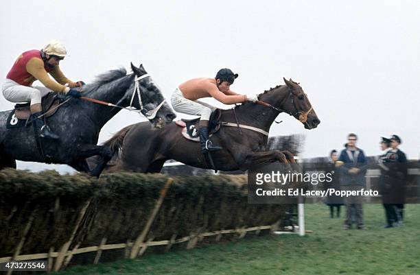 Bobby Beasley riding Yenisei, and John Francome riding Calzado, in action during the Champion Hurdle Challenge Cup at Cheltenham Racecourse in...