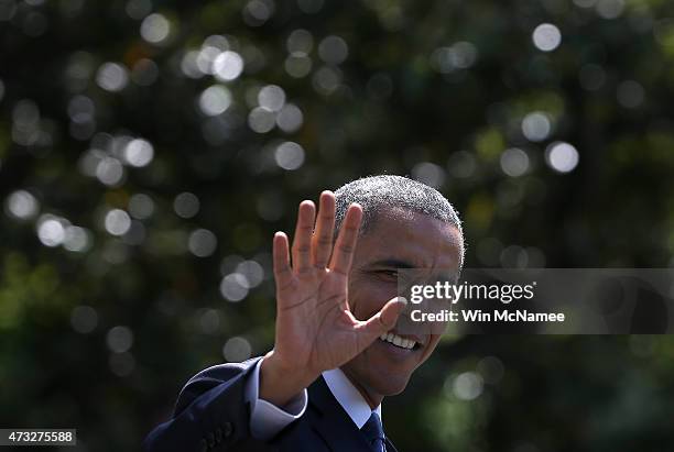 President Barack Obama waves while departing the White House on May 14, 2015 in Washington, DC. Obama was scheduled to travel to Camp David for a...