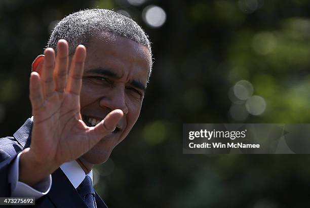 President Barack Obama waves while departing the White House on May 14, 2015 in Washington, DC. Obama was scheduled to travel to Camp David for a...