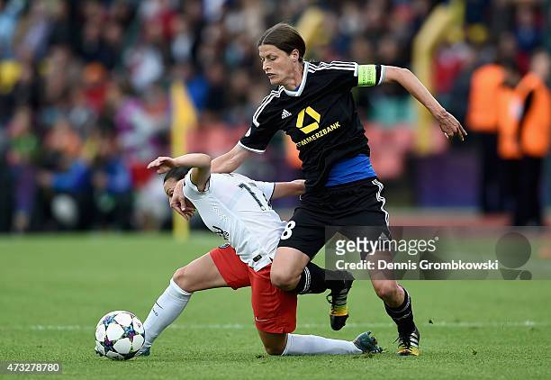 Aurelie Kaci of Paris St. Germain and Kerstin Garefrekes of 1. FFC Frankfurt battle for the ball during the UEFA Women's Champions League Final...