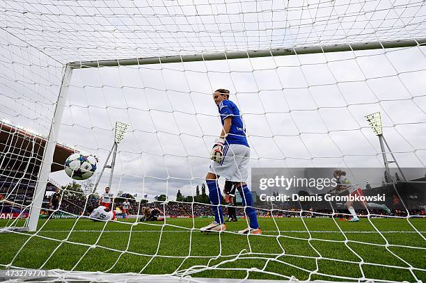 Goalkeeper Desiree Schumann of 1. FFC Frankfurt reacts as Marie-Laure Delie of Paris St. Germain scores their first goal during the UEFA Women's...