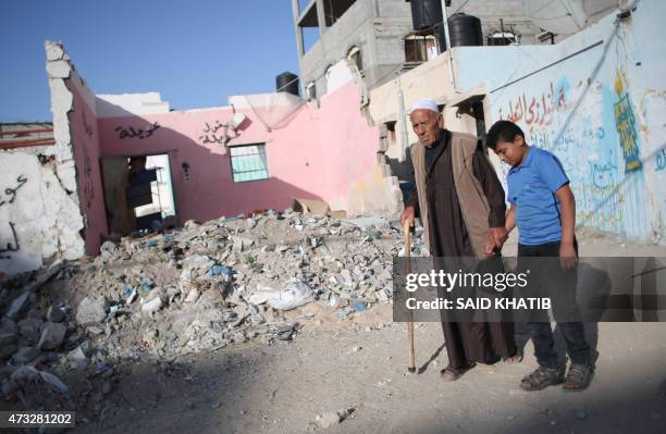 Salman Hamaida, a 75-year-old Palestinian man who was driven out of the town of Ramla during the 1948 war over Israel's creation, walks with his...