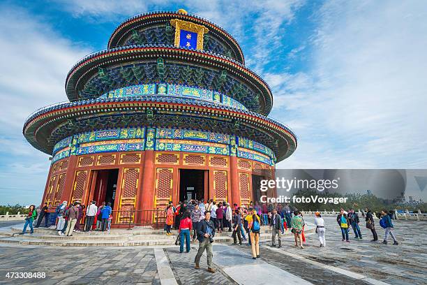 china crowds of chinese tourists visiting temple of heaven beijing - temple of heaven stock pictures, royalty-free photos & images