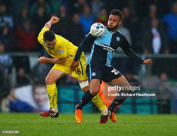 Carl McHugh of Plymouth Argyle and Aaron Holloway of Wycombe Wanderers battle for the ball during the Sky Bet League Two Playoff semi final match...